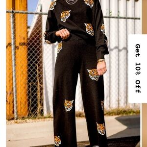 Dressed in LALA fierce female knit playsuit - Medium